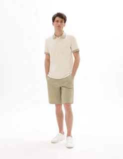 Celio Polo regular jersey en coton stretch - sand^Homme Polos