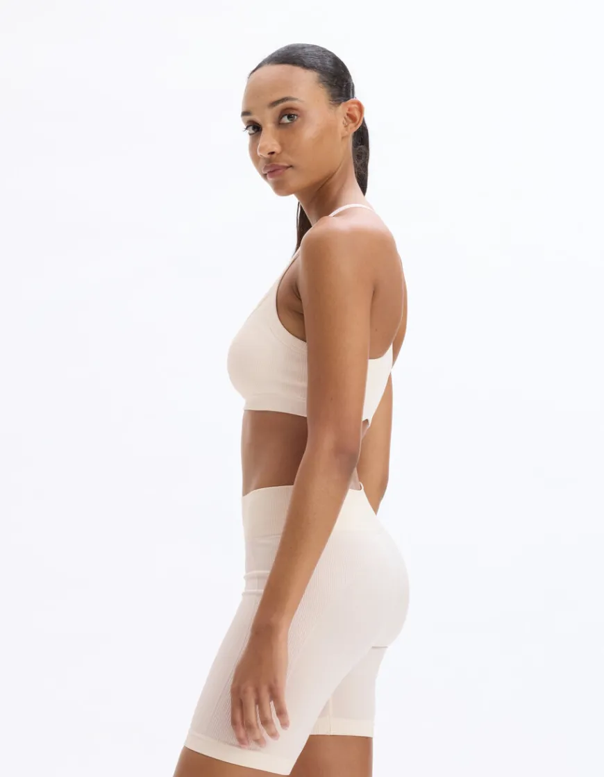 Celio Top sans coutures à fines bretelles - écru^Femme Sportswear|Loungewear