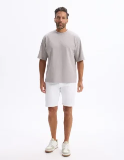 Celio T-shirt oversize col rond rayé - taupe^Homme T-Shirts